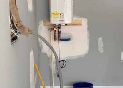 Tankless water heater installation at T.O. Plumbing Service LLC in Fayetteville, NC.